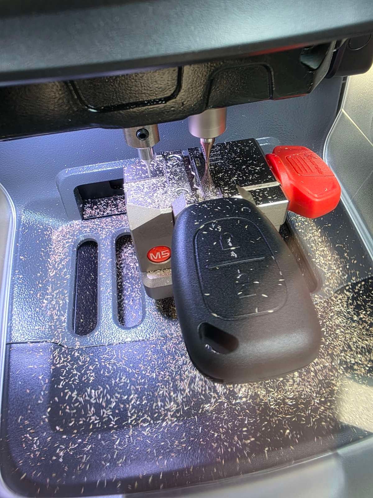 Spare Vauxhall Vivaro key being cut and programmed in Swansea